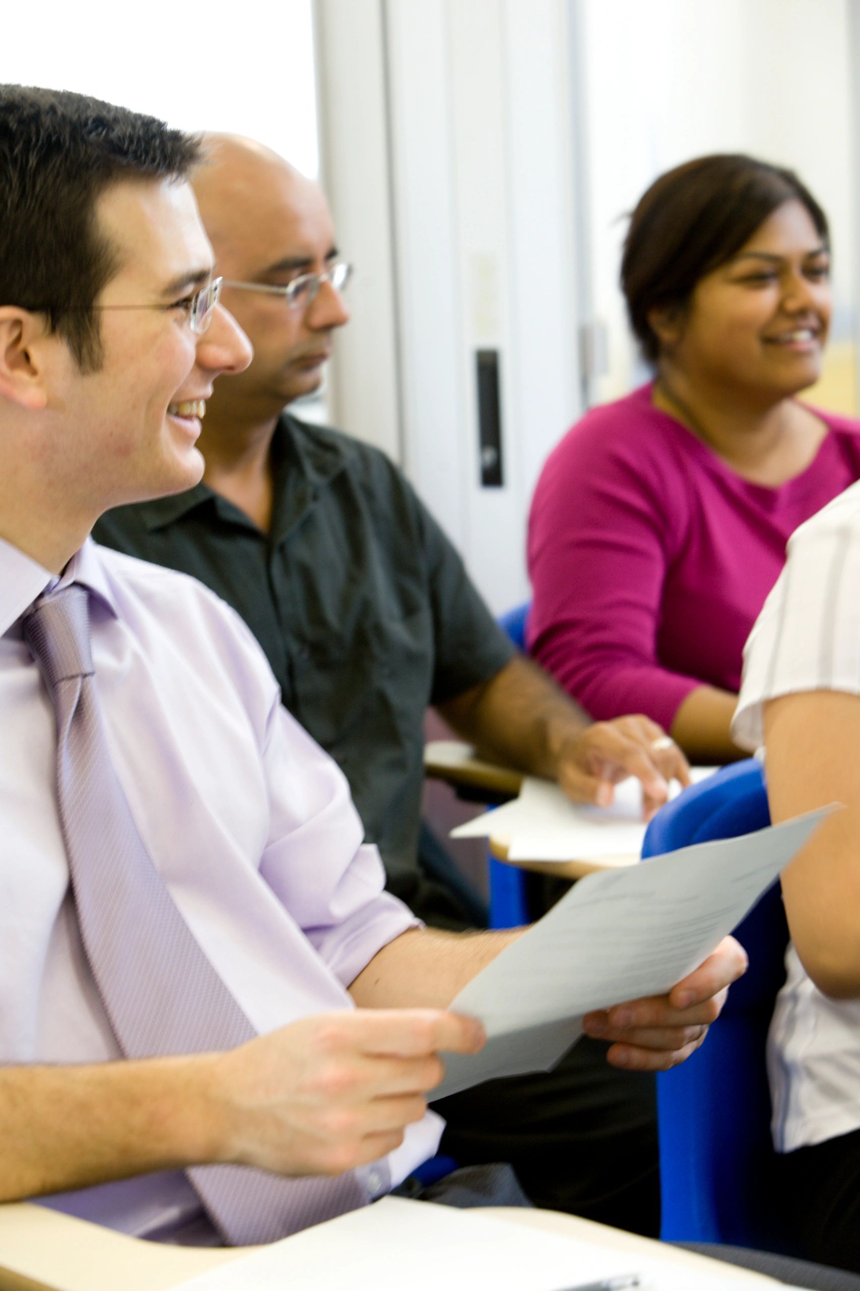 Corporate compliance professionals collaborating