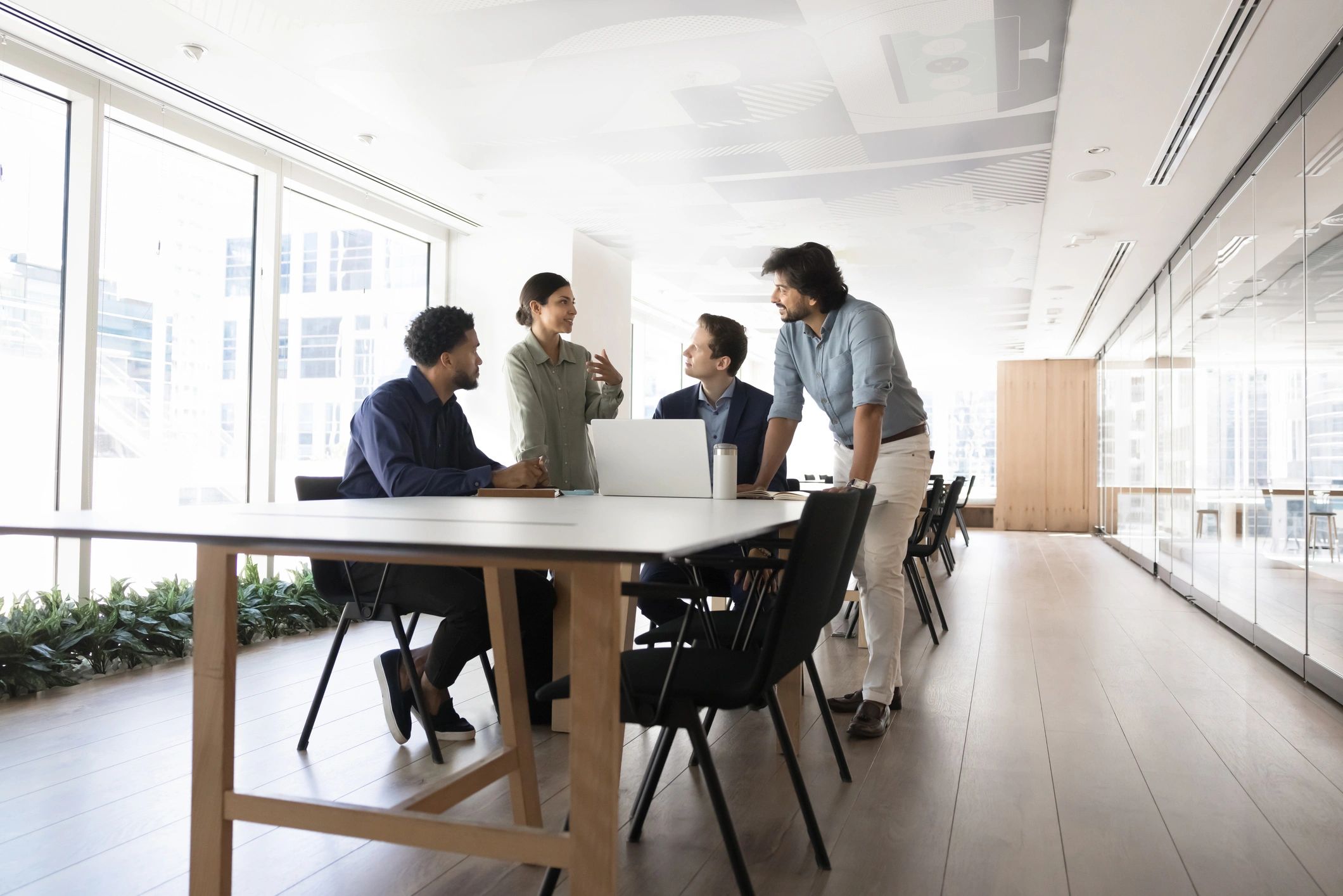 Corporate team meeting around a table