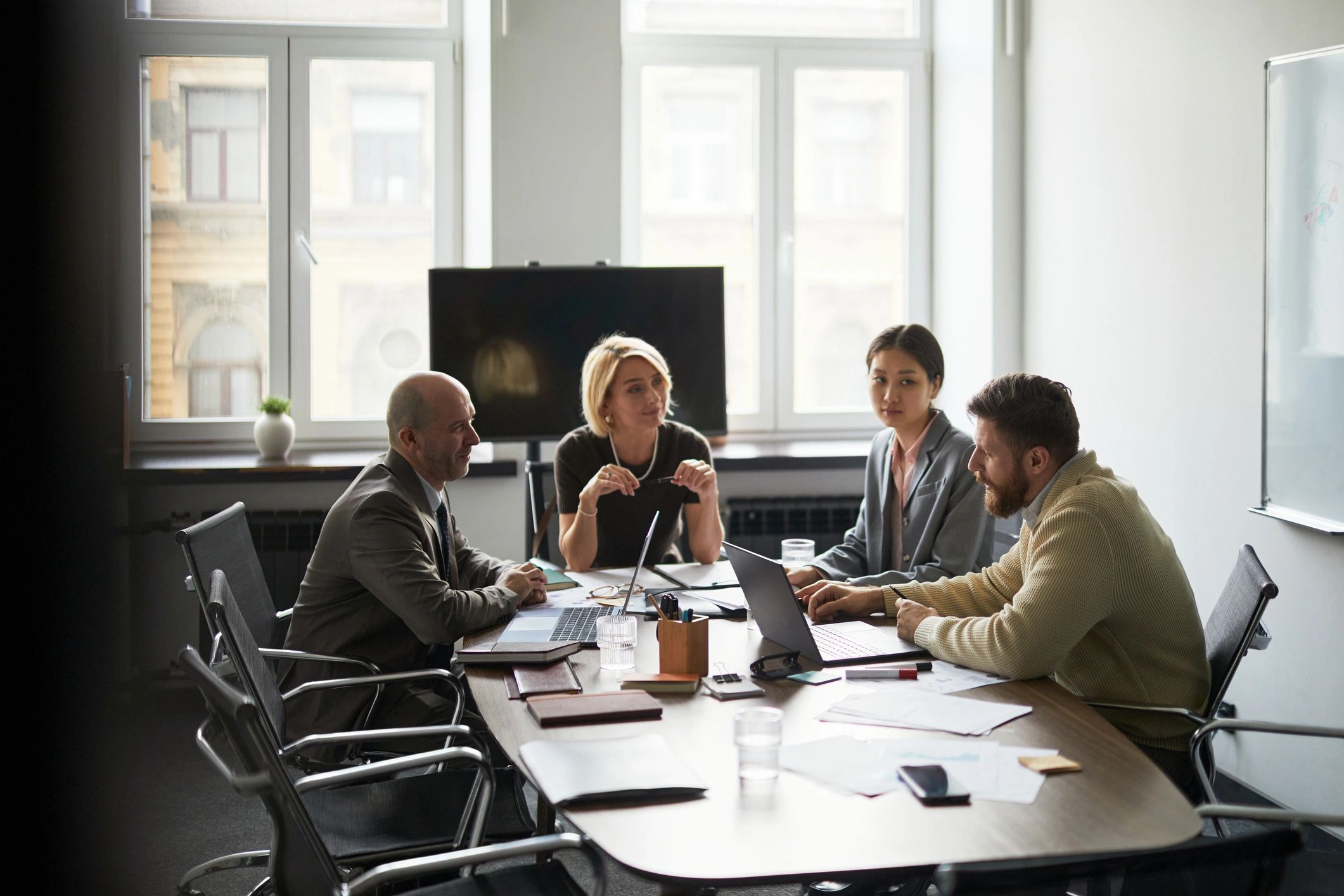 Business team collaborating in a corporate meeting room